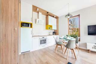 Апартаменты Apartamenty Sun & Snow Gdańsk Bursztynowa Гданьск Апартаменты с 1 спальней, вид на сад-3